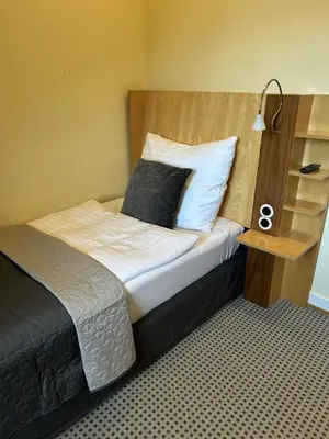 Ein Bett oder Betten in einem Zimmer der Unterkunft Villa Weisser Berg