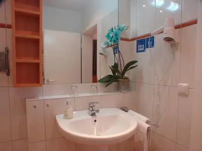 Ein Badezimmer in der Unterkunft Rotenberg PT Hotel