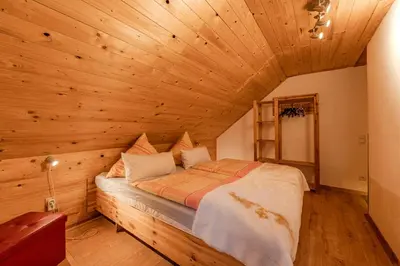Ein Bett oder Betten in einem Zimmer der Unterkunft Ferienhaus Störzel Wohnung B