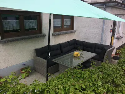 Ein Sitzbereich in der Unterkunft Ferienhaus Störzel Wohnung A