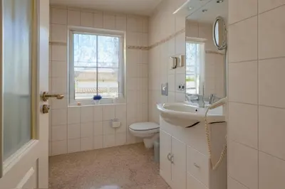 Ein Badezimmer in der Unterkunft Gästehaus Marietta