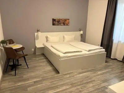 Ein Bett oder Betten in einem Zimmer der Unterkunft Hotel-Fritz
