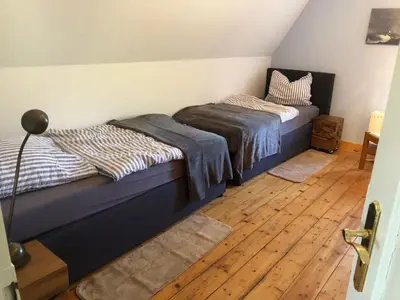 Ein Bett oder Betten in einem Zimmer der Unterkunft Haus Nummer 1, Moselblick