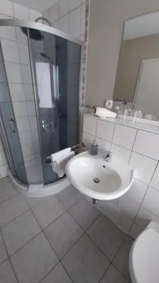 Ein Badezimmer in der Unterkunft Hotel & Restaurant - Zum Schleicher Kuckuck