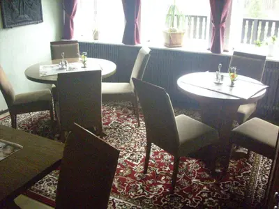 Ein Sitzbereich in der Unterkunft Hotel Europa