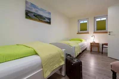 Ein Bett oder Betten in einem Zimmer der Unterkunft Anduns exklusive Scheune - Ferienhaus