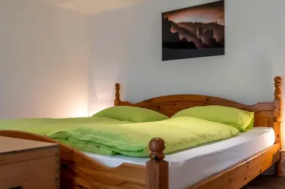 Ein Bett oder Betten in einem Zimmer der Unterkunft Anduns - Ferienhaus