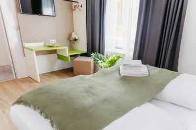 Ein Bett oder Betten in einem Zimmer der Unterkunft bestprice Hotel Koblenz