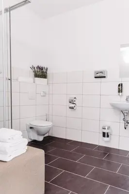 Ein Badezimmer in der Unterkunft bestprice Hotel Koblenz