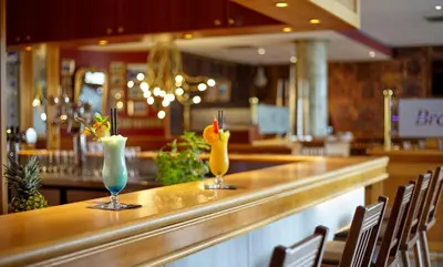 Getränke in der Unterkunft Parkhotel Weiskirchen