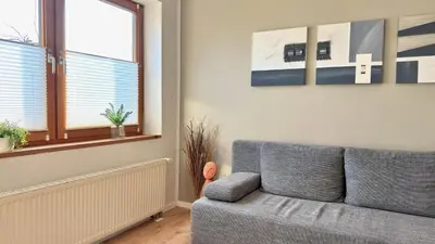 Ein Sitzbereich in der Unterkunft Ferienwohnung Reuscher, Trier-Newel