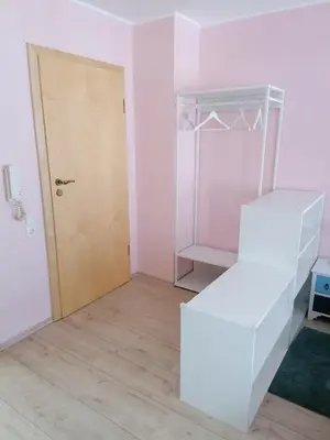 Ein Bett oder Betten in einem Zimmer der Unterkunft Ferienwohnungen Burgfrieden 6