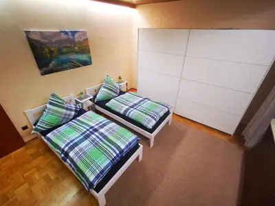 Ein Bett oder Betten in einem Zimmer der Unterkunft Ferienwohnung Maria Laach 3