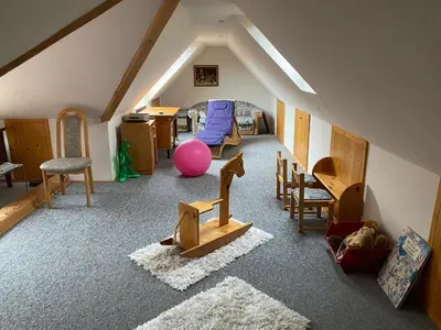 Ein Sitzbereich in der Unterkunft Ferienwohnung Unter dem Schild