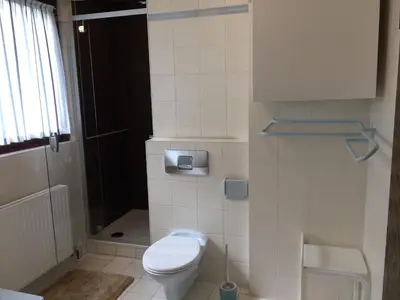 Ein Badezimmer in der Unterkunft Ferienwohnung Unter dem Schild