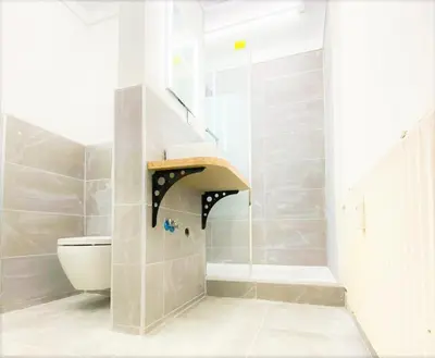 Ein Badezimmer in der Unterkunft Alte Schule Gästehaus - Fräulein Apartment