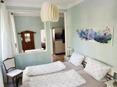 Ein Bett oder Betten in einem Zimmer der Unterkunft Ehem. Sommerresidenz von Fürst Friedrich III. App.1 und App.2