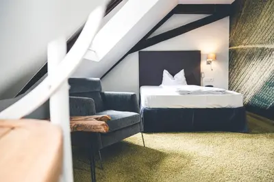 Ein Bett oder Betten in einem Zimmer der Unterkunft Hotel Deutschherrenhof