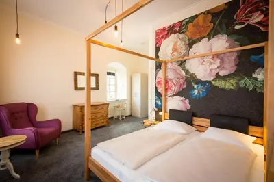 Ein Bett oder Betten in einem Zimmer der Unterkunft Hotel Deutschherrenhof