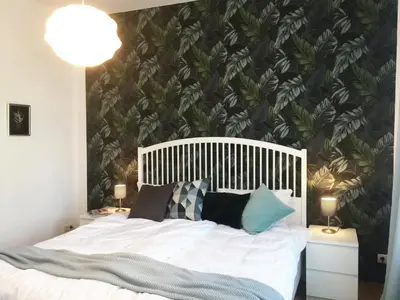 Ein Bett oder Betten in einem Zimmer der Unterkunft Römerburg Apartments Burgstraße