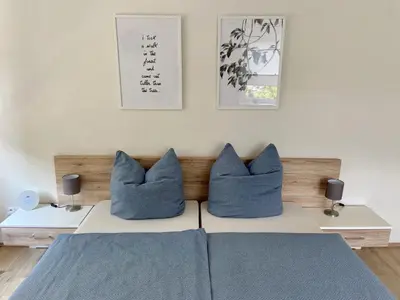 Ein Bett oder Betten in einem Zimmer der Unterkunft Ferienwohnung Flur 34