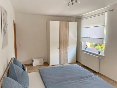 Ein Bett oder Betten in einem Zimmer der Unterkunft Ferienwohnung Flur 34