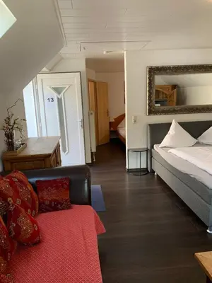 Ein Bett oder Betten in einem Zimmer der Unterkunft Stumbergers Hotel - free parking -