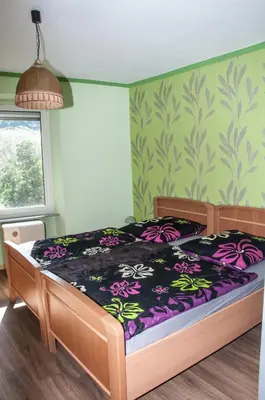 Ein Bett oder Betten in einem Zimmer der Unterkunft Ferienhaus an der Mosel