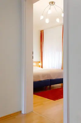 Ein Bett oder Betten in einem Zimmer der Unterkunft Hotel Trierer Hof