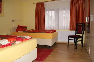 Ein Bett oder Betten in einem Zimmer der Unterkunft Hotel Kugel