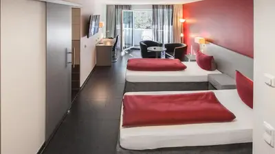 Ein Bett oder Betten in einem Zimmer der Unterkunft Hotel Zur Post
