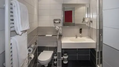 Ein Badezimmer in der Unterkunft Hotel Zur Post