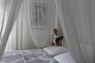 Ein Bett oder Betten in einem Zimmer der Unterkunft Hotel Simonis