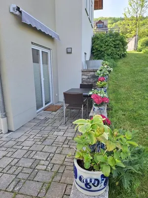 Ein Garten an der Unterkunft Ferienwohnung an der Obermosel