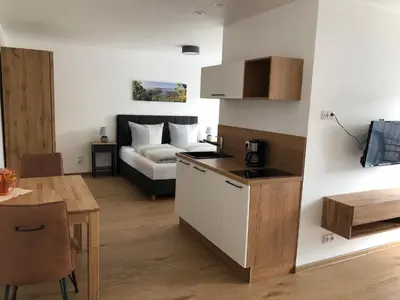 Ein Bett oder Betten in einem Zimmer der Unterkunft Wein und Gästehaus Hüls