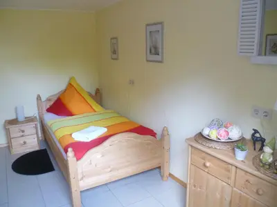 Ein Bett oder Betten in einem Zimmer der Unterkunft Eifelferienhaus Thome