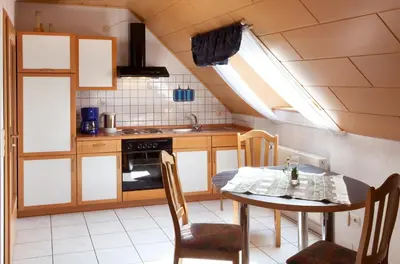 Küche/Küchenzeile in der Unterkunft Ferienweingut Klaus Thiesen Gästezimmer und Apartments