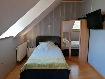 Ein Bett oder Betten in einem Zimmer der Unterkunft Knoofs