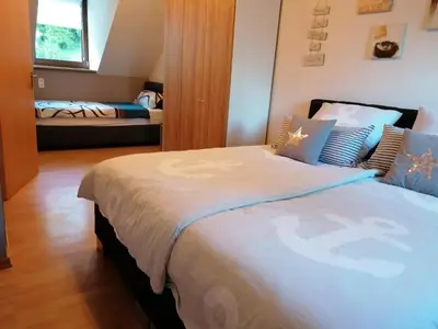 Ein Bett oder Betten in einem Zimmer der Unterkunft Knoofs