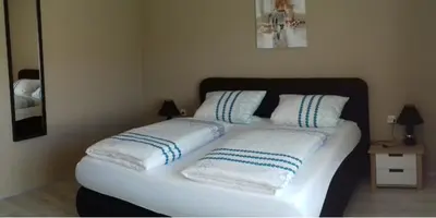 Ein Bett oder Betten in einem Zimmer der Unterkunft Weingut J. A. Meyer