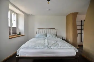 Ein Bett oder Betten in einem Zimmer der Unterkunft Ferienhaus Baustert