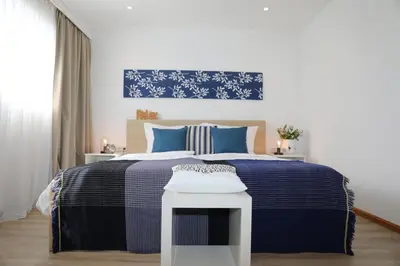 Ein Bett oder Betten in einem Zimmer der Unterkunft Hotel Weinlaube
