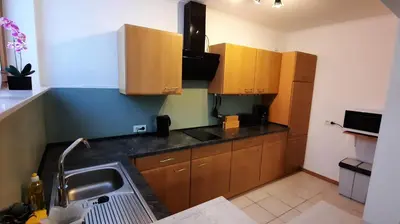 Küche/Küchenzeile in der Unterkunft Ferienwohnung Bausenbergblick