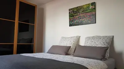 Ein Bett oder Betten in einem Zimmer der Unterkunft Ferienwohnung im Herzen Neuwied - Heddesdorf