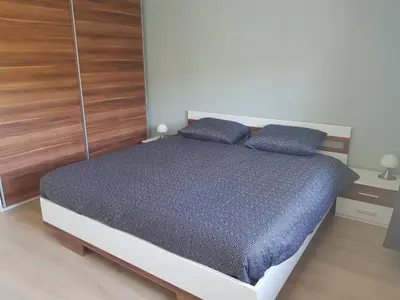 Ein Bett oder Betten in einem Zimmer der Unterkunft Dolce Vita Gerolstein -Dani
