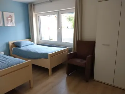 Ein Bett oder Betten in einem Zimmer der Unterkunft Dolce Vita Gerolstein -Dani