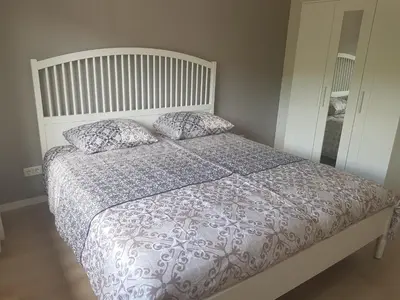Ein Bett oder Betten in einem Zimmer der Unterkunft Dolce Vita Gerolstein -Dani