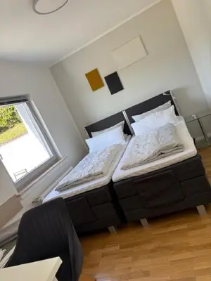 Ein Bett oder Betten in einem Zimmer der Unterkunft KickEns