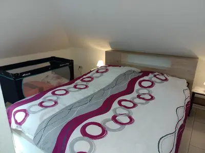 Ein Bett oder Betten in einem Zimmer der Unterkunft FeWo Nala II