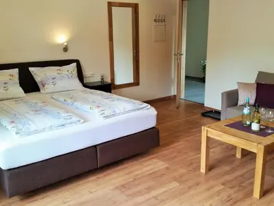 Ein Bett oder Betten in einem Zimmer der Unterkunft Landgasthof Winzerscheune